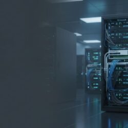 Nvidia Vera Rubin Photorealistic wide banner image of a modern data center aisle featuring a prominent AI supercomputer rack with liquid cooling, high-speed cabling, and glowing LEDs, set against a cool-toned industrial background with additional racks.